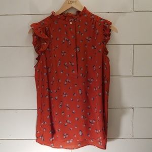 Red ruffle floral shell